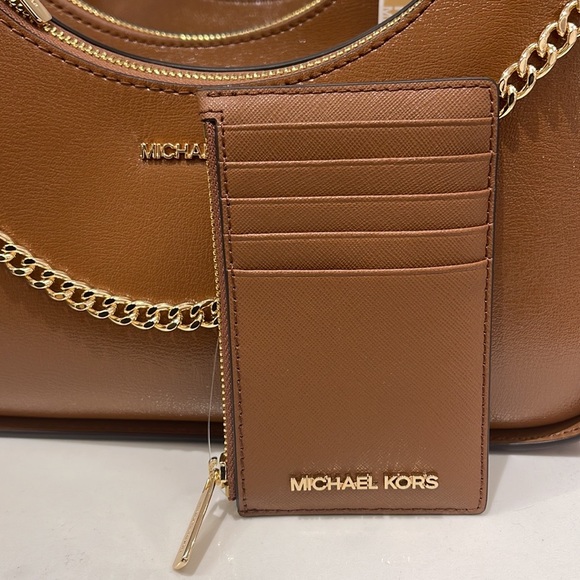 MICHAEL KORS
Jet Set Travel Medium Top Zip Leather Card Case Wallet 
Luggage
NWT - Picture 8 of 16